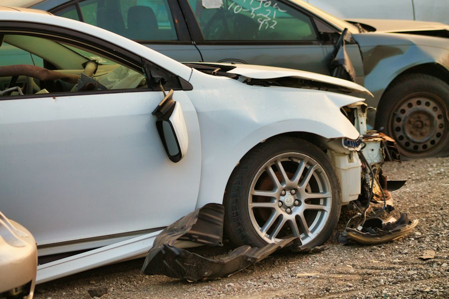 A car with front-end damage after a collision