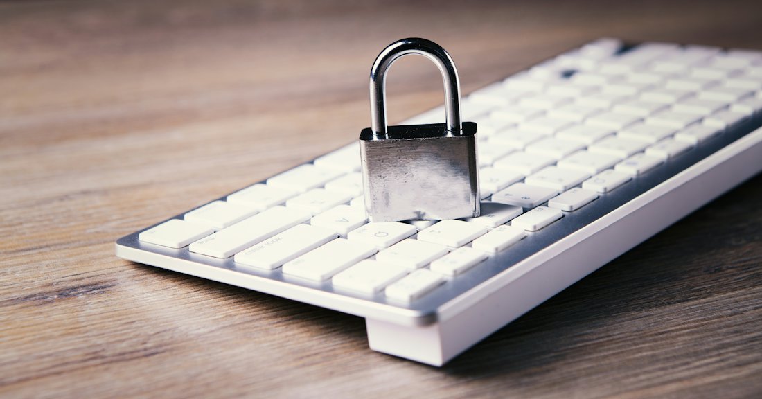 A padlock resting on a keyboard to represent data privacy