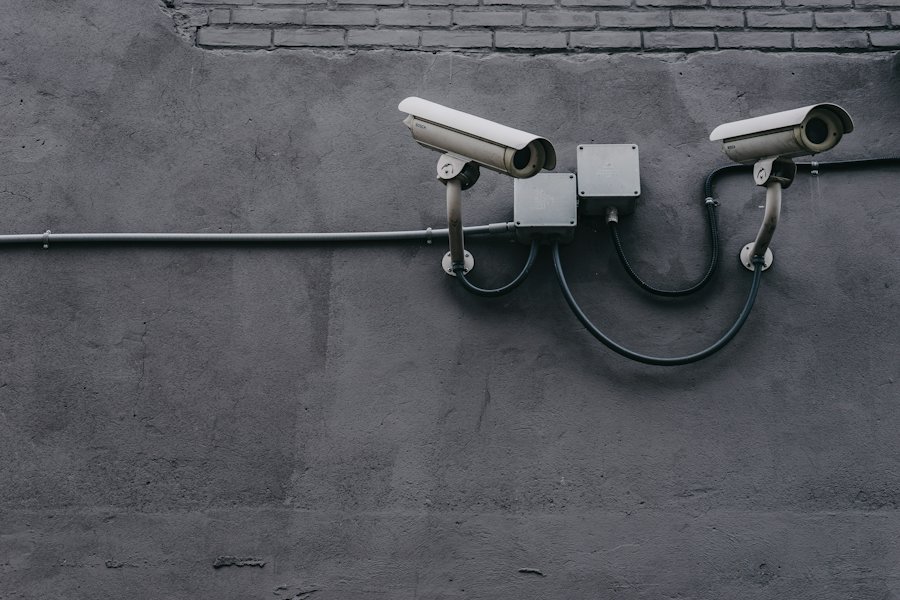 Store CCTV cameras mounted on a wall that can record a fall